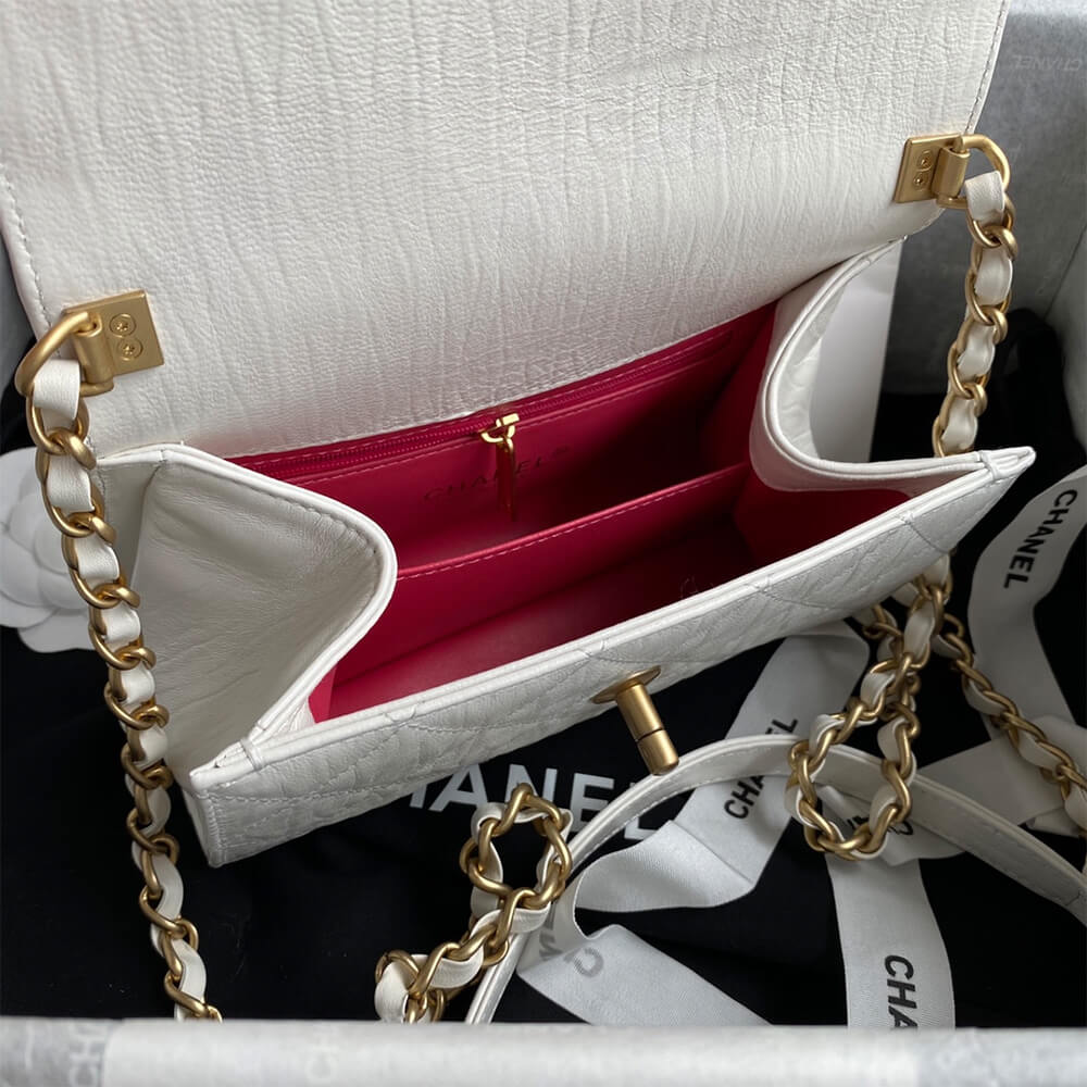 Ch*el mini flap bag with top handle