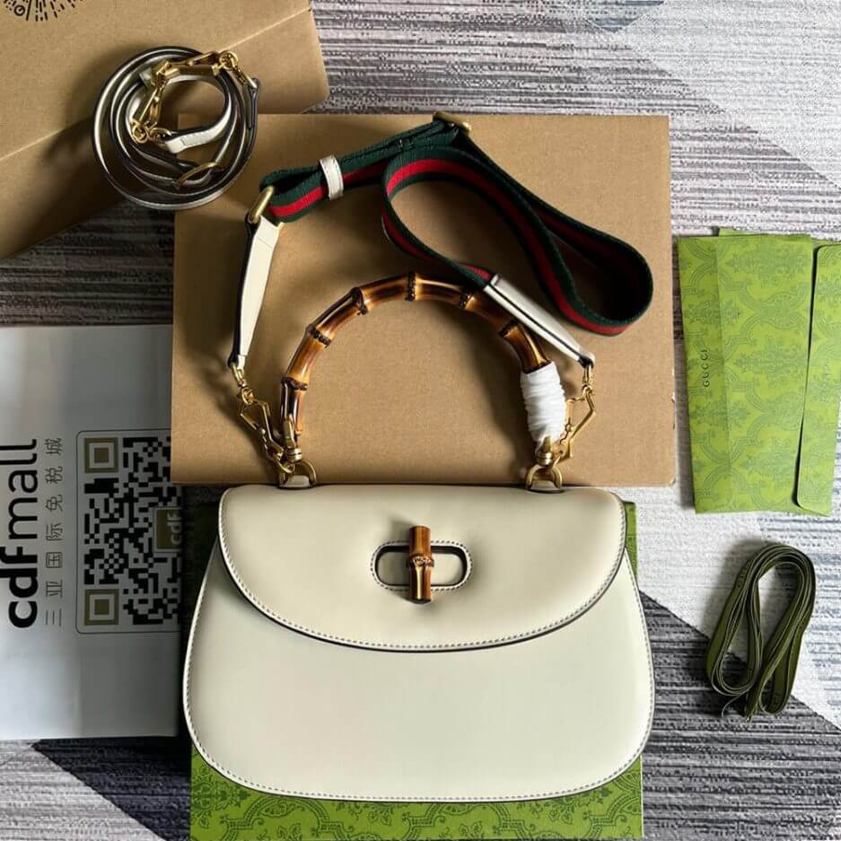 G*u*i bamboo 1947 medium top handle bag