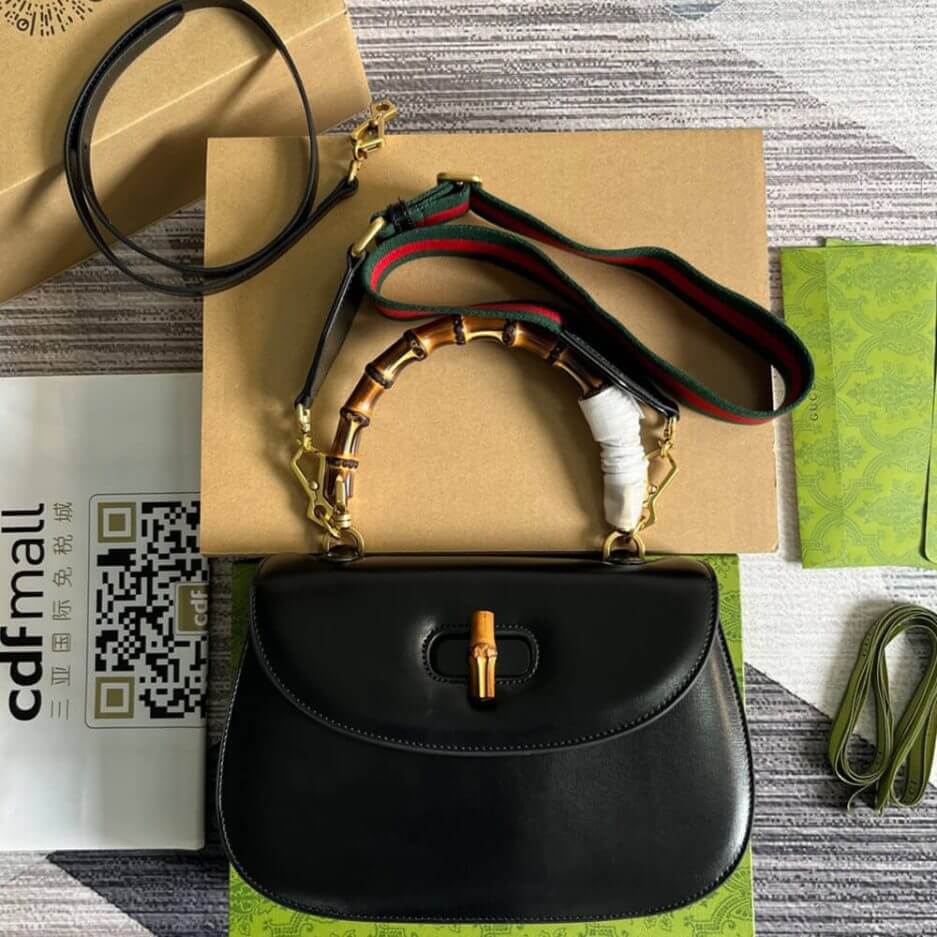G*u*i bamboo 1947 medium top handle bag