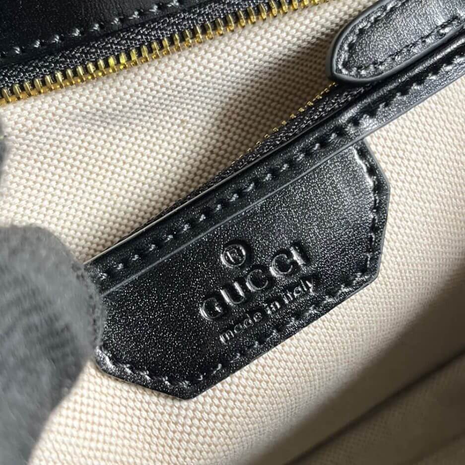 G*u*i bamboo 1947 medium top handle bag